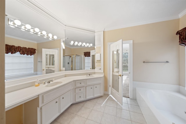 full bathroom featuring crown molding, a sink, a bath, and double vanity