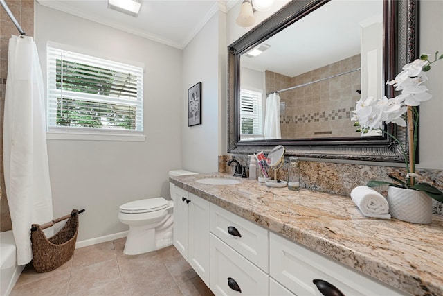 full bathroom featuring a healthy amount of sunlight, tile patterned floors, ornamental molding, and toilet