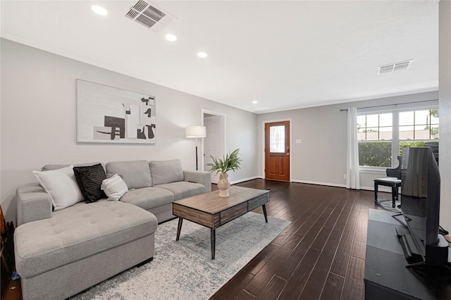 living room with recessed lighting, baseboards, dark wood finished floors, and visible vents