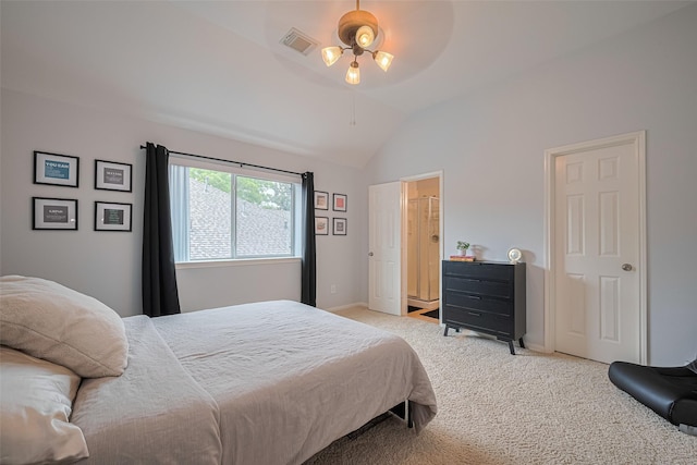 bedroom featuring visible vents, baseboards, vaulted ceiling, and light carpet