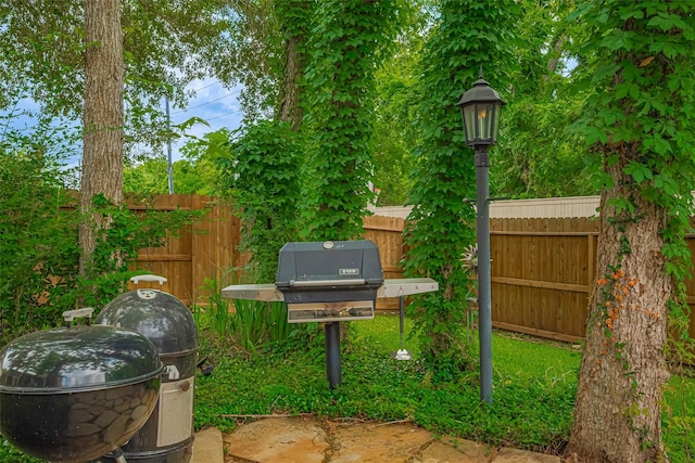 exterior details featuring a fenced backyard