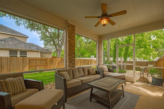 sunroom / solarium with an outdoor hangout area and ceiling fan
