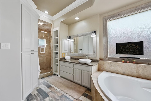 full bath with vanity, recessed lighting, a shower stall, ornamental molding, and a bath
