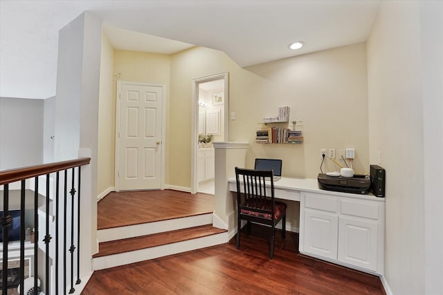office with recessed lighting, baseboards, dark wood-style flooring, and built in desk
