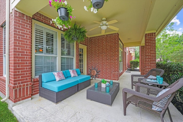 view of patio / terrace with an outdoor living space and ceiling fan