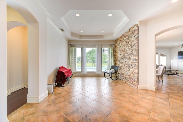 living area featuring crown molding, recessed lighting, and visible vents
