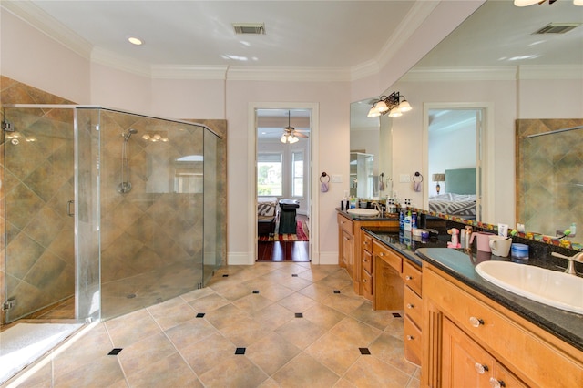bathroom featuring vanity, a stall shower, visible vents, and ensuite bath