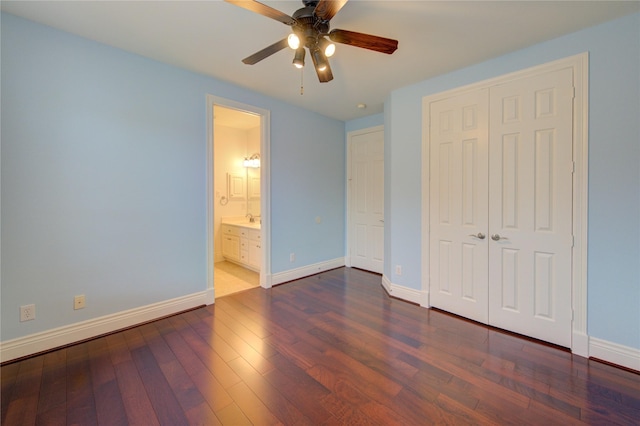 unfurnished bedroom featuring baseboards, a ceiling fan, a closet, and wood finished floors