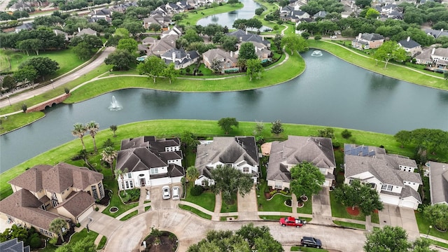 aerial view with a water view and a residential view