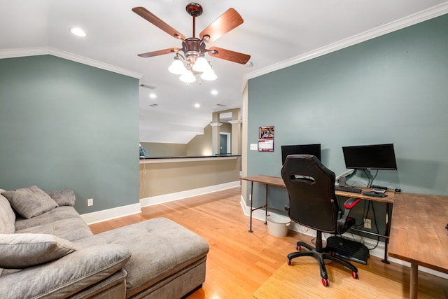 office with ornamental molding, wood finished floors, lofted ceiling, baseboards, and ceiling fan