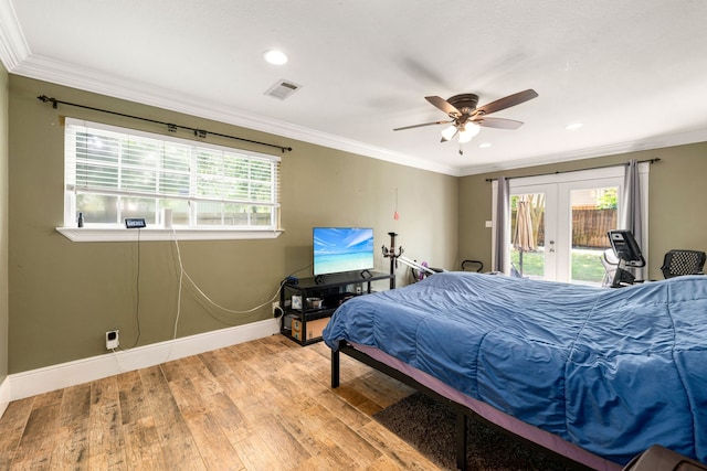 bedroom with visible vents, baseboards, access to outside, light wood-type flooring, and french doors