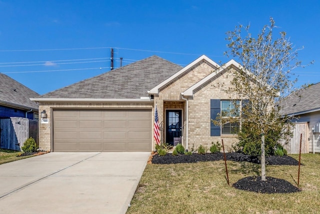 949 Gentle Moss Dr, Magnolia, TX 77354 - ranch-style home with a garage, concrete driveway, a front lawn, and brick siding