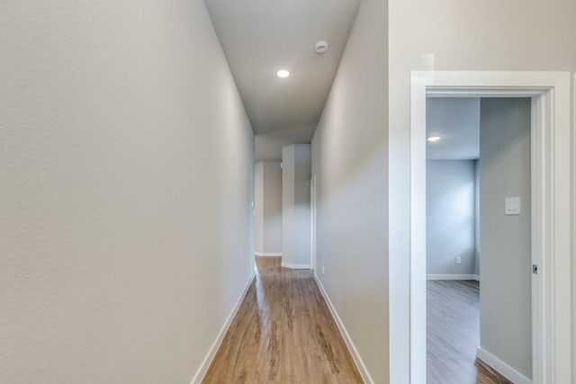 949 Gentle Moss Dr, Magnolia, TX 77354 - hallway with recessed lighting, baseboards, and wood finished floors