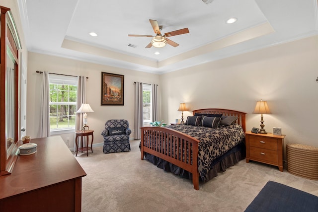 19486 Humaya Dr, Porter, TX 77365 - bedroom with crown molding, visible vents, light colored carpet, recessed lighting, and a raised ceiling