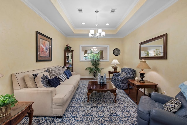 19486 Humaya Dr, Porter, TX 77365 - living area with crown molding, a chandelier, a tray ceiling, and visible vents