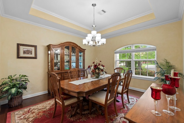 19486 Humaya Dr, Porter, TX 77365 - dining room with baseboards, an inviting chandelier, wood finished floors, and a raised ceiling