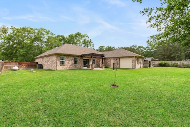 19486 Humaya Dr, Porter, TX 77365 - rear view of house featuring a fenced backyard, a gate, a lawn, and brick siding