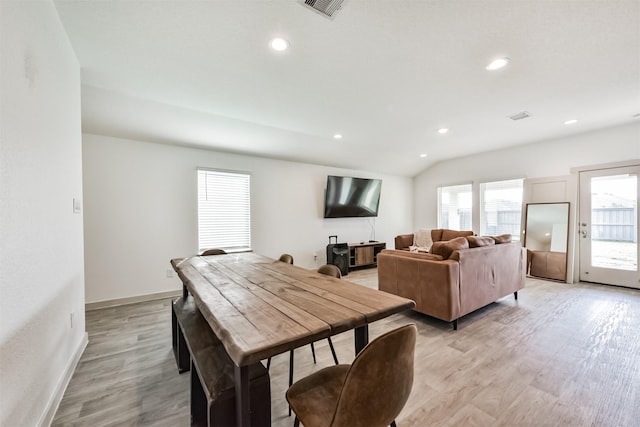 dining room with recessed lighting, light wood-type flooring, and visible vents