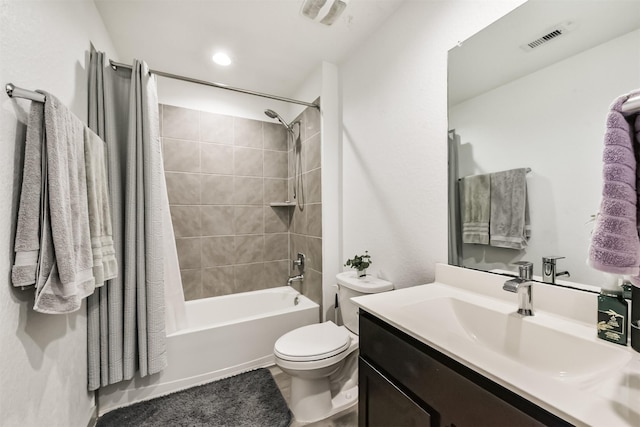 full bath featuring toilet, visible vents, bathing tub / shower combination, and vanity