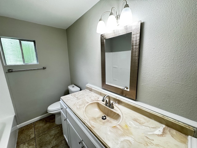 bathroom featuring toilet, baseboards, tile patterned flooring, and vanity