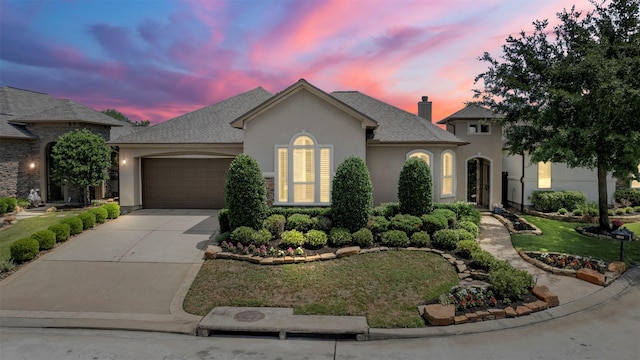 13614 Boerne Canyon Ln, Cypress, TX 77429 - french provincial home with a garage, stucco siding, driveway, and a front yard