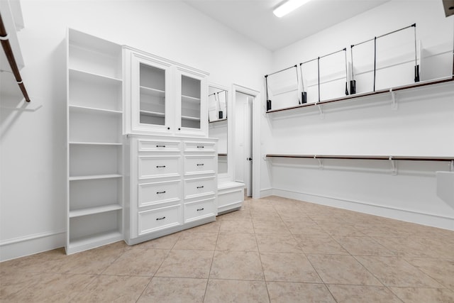13614 Boerne Canyon Ln, Cypress, TX 77429 - spacious closet featuring light tile patterned floors