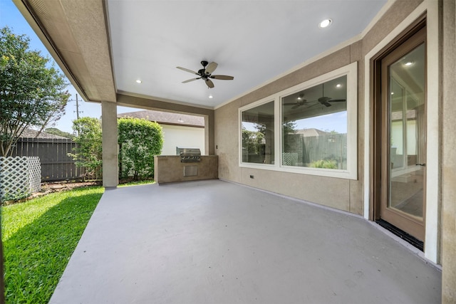 13614 Boerne Canyon Ln, Cypress, TX 77429 - view of patio / terrace featuring an outdoor kitchen, a ceiling fan, fence, and a grill