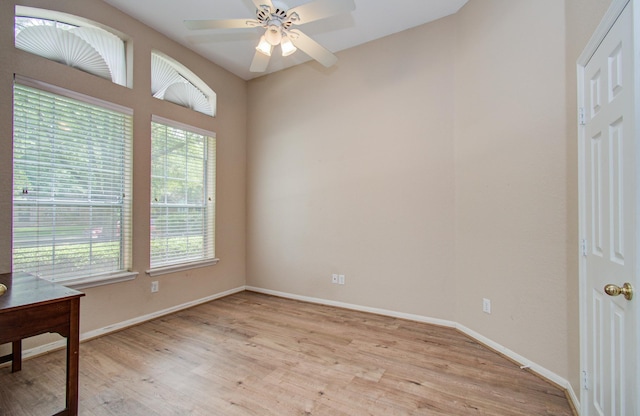 18611 Camellia Estates Ln, Cypress, TX 77429 - unfurnished office with baseboards, a ceiling fan, and light wood-style flooring