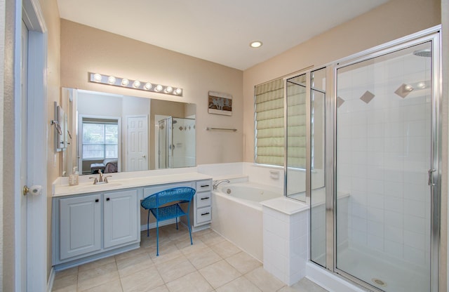 18611 Camellia Estates Ln, Cypress, TX 77429 - full bathroom with a bath, a shower stall, vanity, tile patterned floors, and ensuite bath