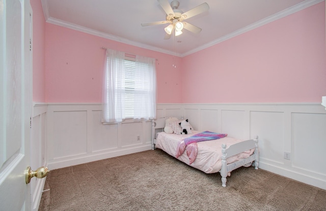 18611 Camellia Estates Ln, Cypress, TX 77429 - carpeted bedroom featuring crown molding, a wainscoted wall, and a decorative wall