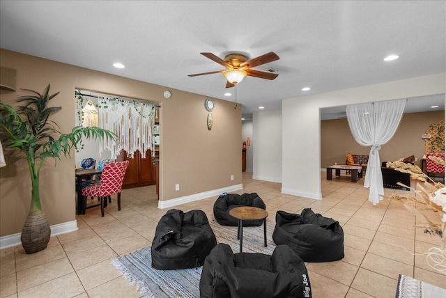interior space featuring recessed lighting, a ceiling fan, and light tile patterned floors