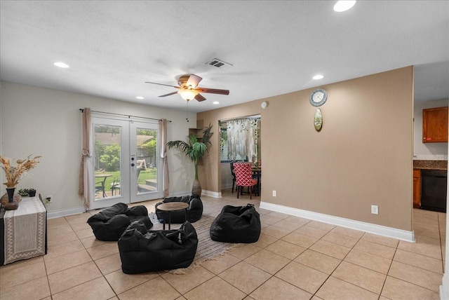 sitting room featuring recessed lighting, ceiling fan, and light tile patterned floors