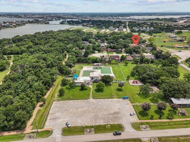 birds eye view of property featuring a water view