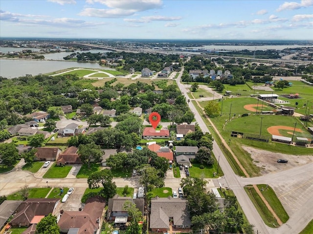 aerial view featuring a residential view and a water view
