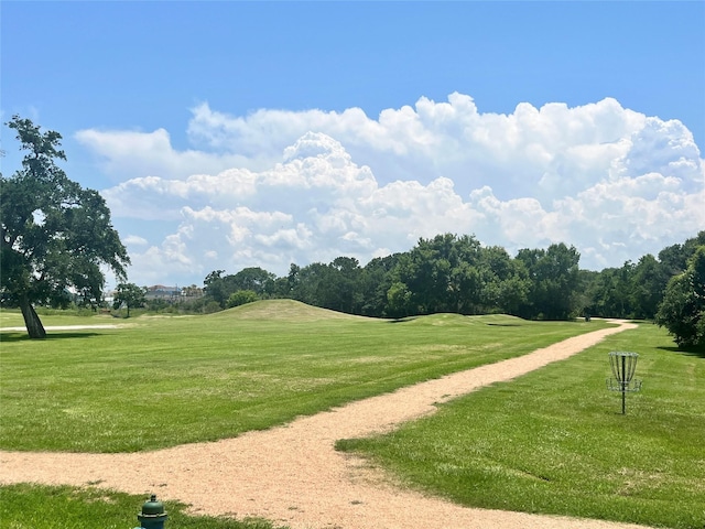 view of home's community with a lawn