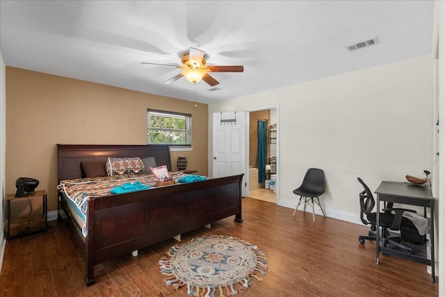 bedroom with visible vents, baseboards, ceiling fan, and wood finished floors