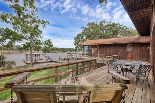 6348 County Road 659, Brazoria, TX 77422 - wooden terrace featuring a water view and outdoor dining space