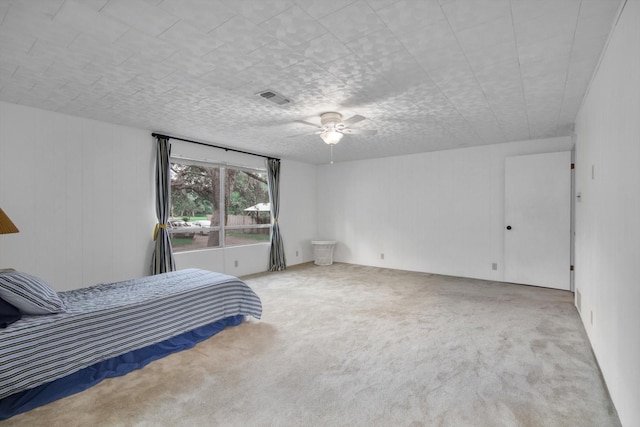 6348 County Road 659, Brazoria, TX 77422 - unfurnished bedroom with ceiling fan, carpet, and visible vents
