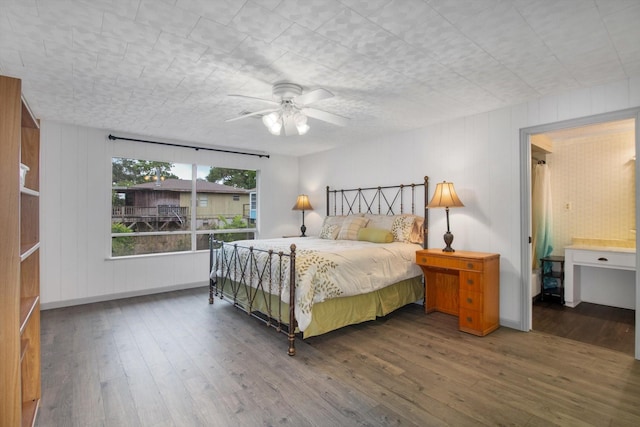 6348 County Road 659, Brazoria, TX 77422 - bedroom with wood-type flooring and ceiling fan