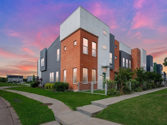 view of property at dusk