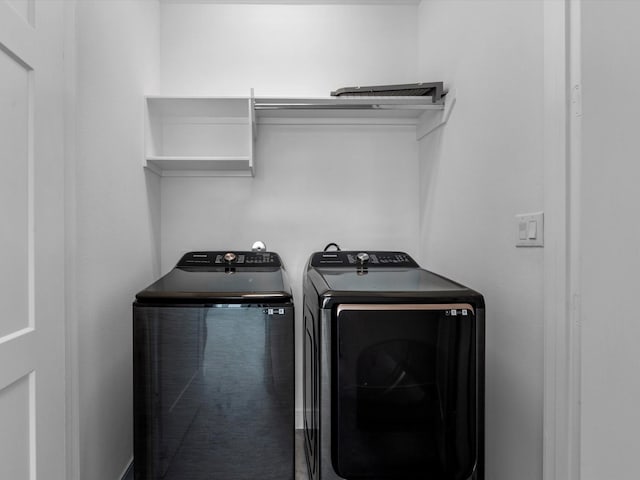 laundry area featuring laundry area and washer and clothes dryer