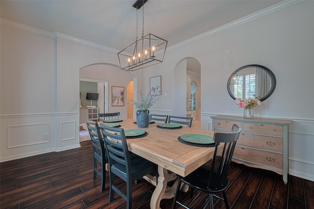 1307 Romero Dr, Pearland, TX 77581 - dining area featuring ornamental molding, arched walkways, and dark wood-type flooring