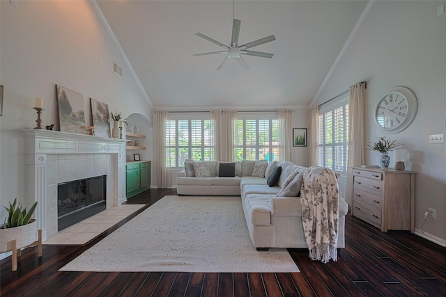 1307 Romero Dr, Pearland, TX 77581 - living room featuring dark wood-style flooring, ornamental molding, and high vaulted ceiling