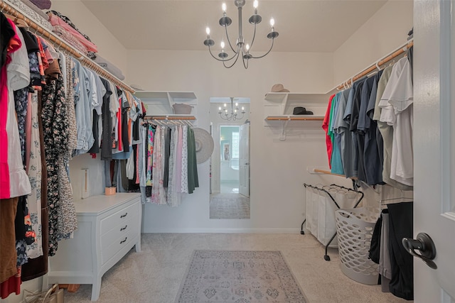 1307 Romero Dr, Pearland, TX 77581 - walk in closet featuring a chandelier and light colored carpet