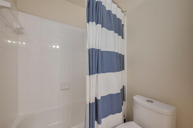 1307 Romero Dr, Pearland, TX 77581 - full bathroom featuring shower / tub combo with curtain and toilet