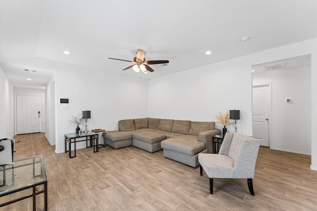 living room featuring ceiling fan, recessed lighting, baseboards, light wood-type flooring, and visible vents