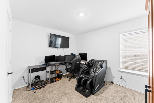 carpeted office space with baseboards