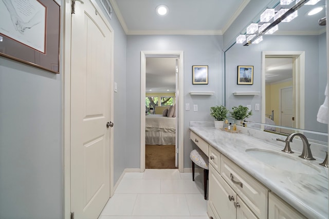 8944 Chatsworth Dr, Houston, TX 77024 - bathroom featuring vanity, tile patterned floors, recessed lighting, baseboards, and ornamental molding