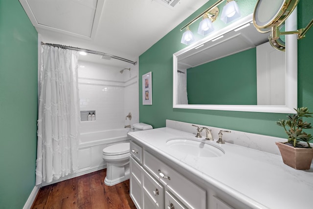 8944 Chatsworth Dr, Houston, TX 77024 - bathroom with vanity, toilet, wood finished floors, and shower / tub combo