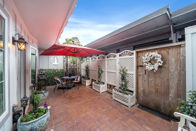 8944 Chatsworth Dr, Houston, TX 77024 - view of patio featuring fence and outdoor dining space
